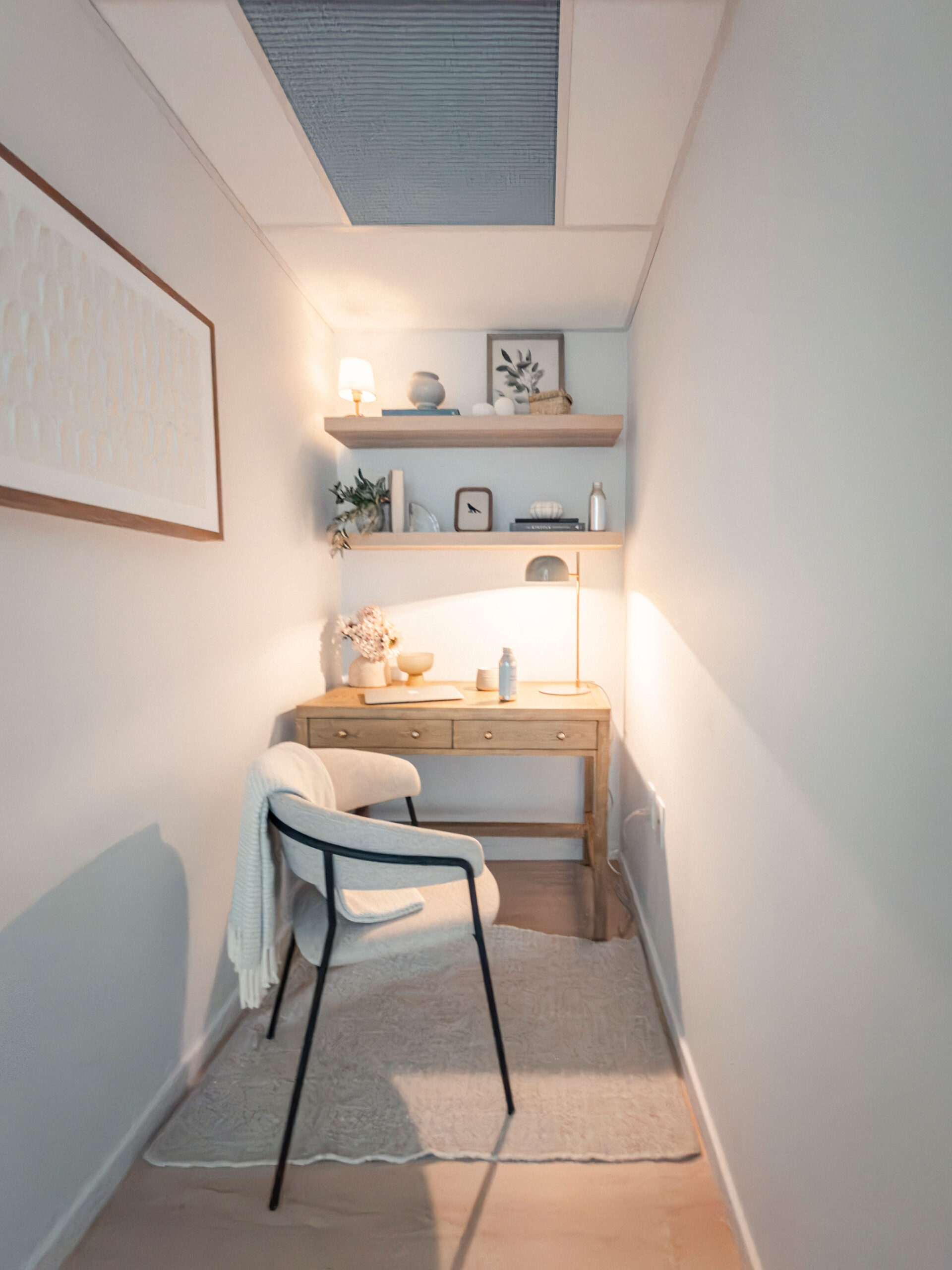 Flexible den with built-in desk, shelving, and lighting in modern Vancouver condo